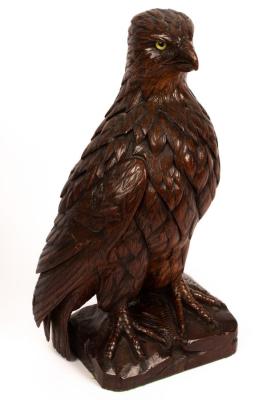 Appraisal: A Spanish wood figure of a standing eagle with beaded