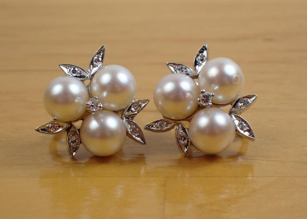 Appraisal: PAIR OF PEARL AND DIAMOND SCREW BACK EARRINGS each k