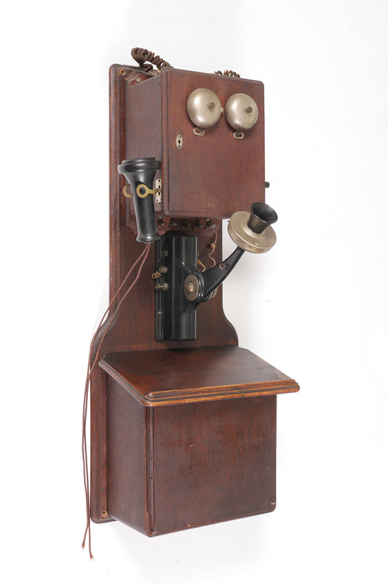 Appraisal: WESTERN ELECTRIC OAK CRANK WALL PHONE Vintage crank phone transmitter