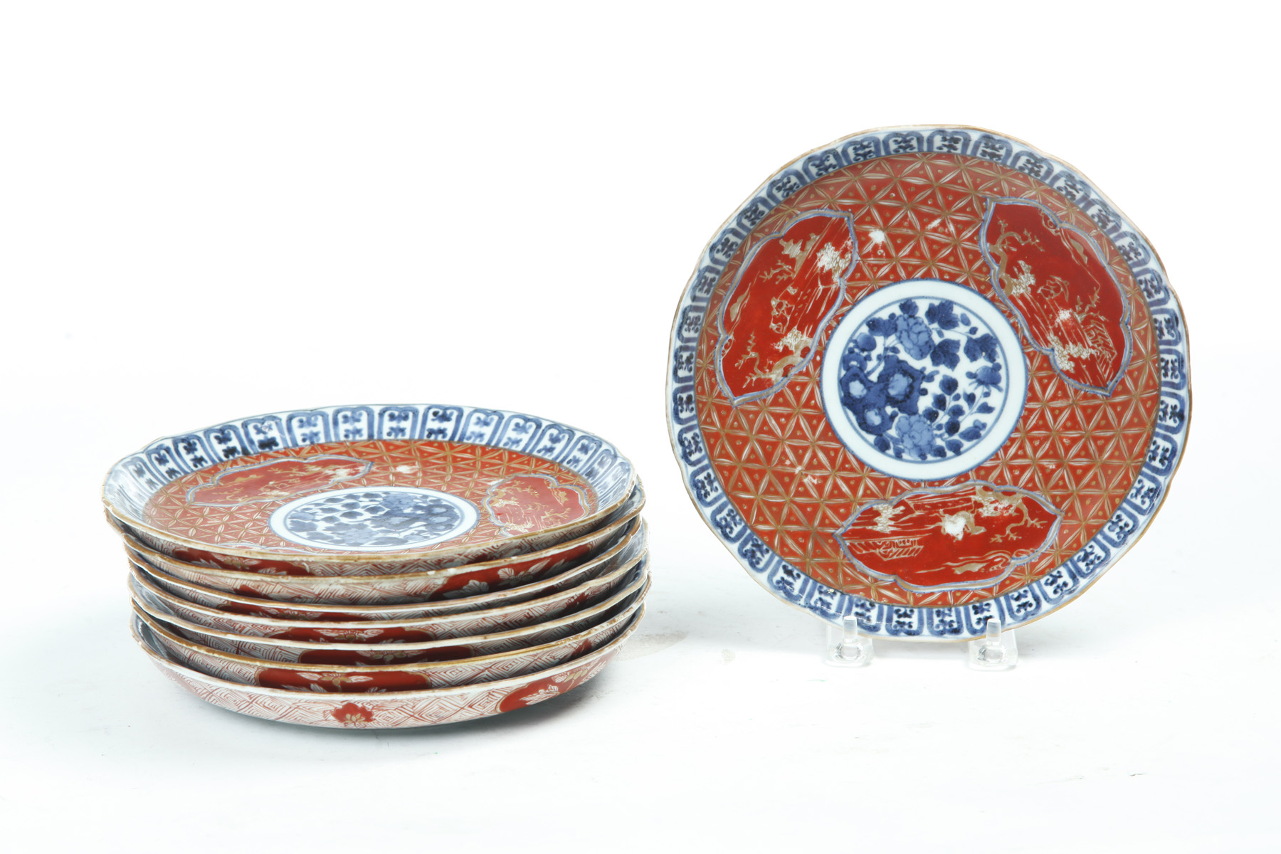 Appraisal: EIGHT IMARI PLATES China th century Rust and blue decoration