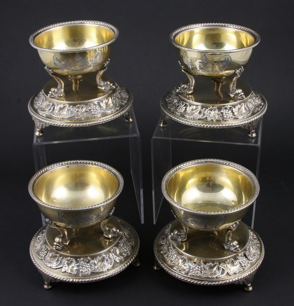 Appraisal: Set of four English silver master salts having dolphin form