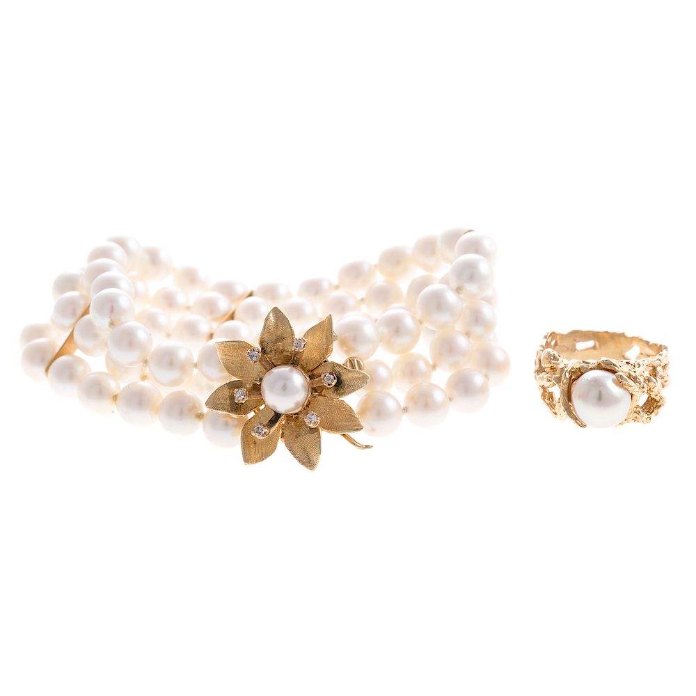 Appraisal: A Triple Strand Pearl Bracelet Ring in K K yellow