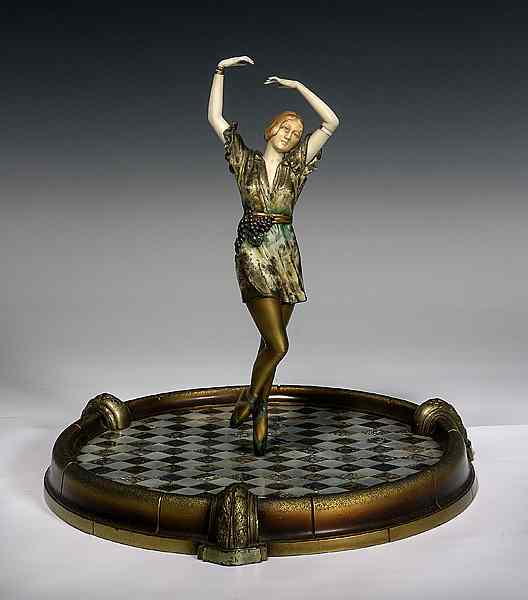 Appraisal: Cold Painted Bronze and Carved Ivory Figure after D Charol