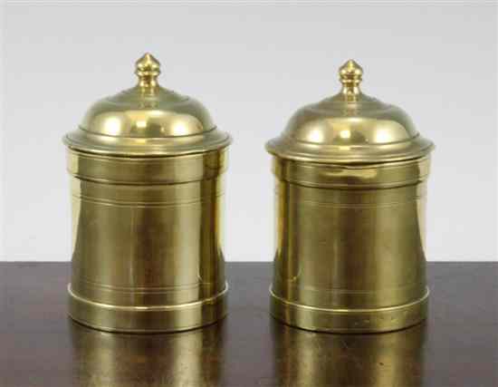 Appraisal: A George III turned brass pounce pot and cover and