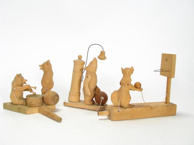 Appraisal: Group of three wooden carved Russian toys vintage depicting bears