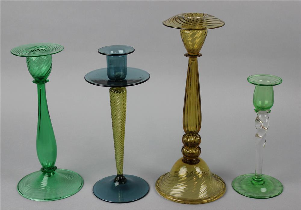 Appraisal: GROUP OF FOUR STEUBEN GLASS CANDLESTICKS first quarter th Century