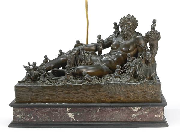 Appraisal: A patinated bronze allegorical group of the Nile now as