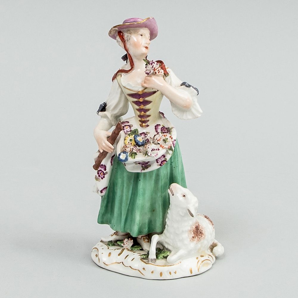 Appraisal: Meissen Porcelain Figure of a Shepherdess Marked in underglaze blue