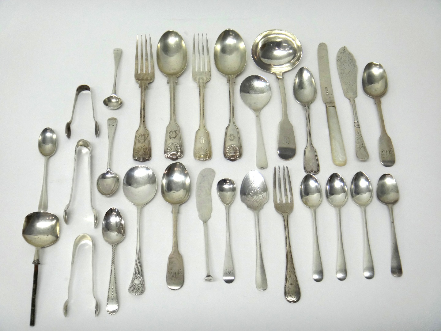 Appraisal: Silver table flatware comprising a Victorian fiddle pattern sauce ladle