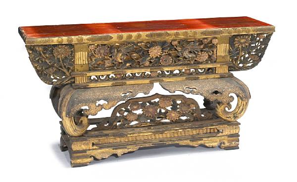 Appraisal: A gilt lacquer decorated wood altar table Edo Period With