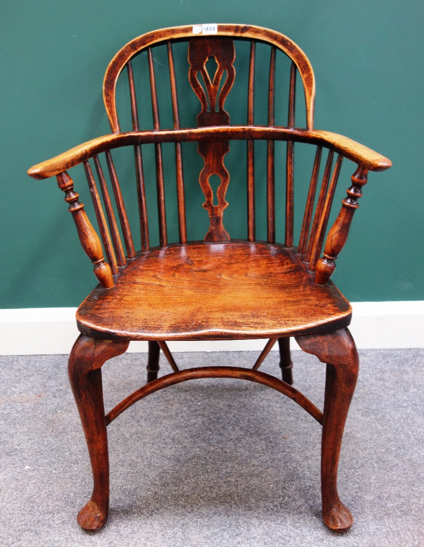 Appraisal: A George III oak and elm bow back Windsor chair