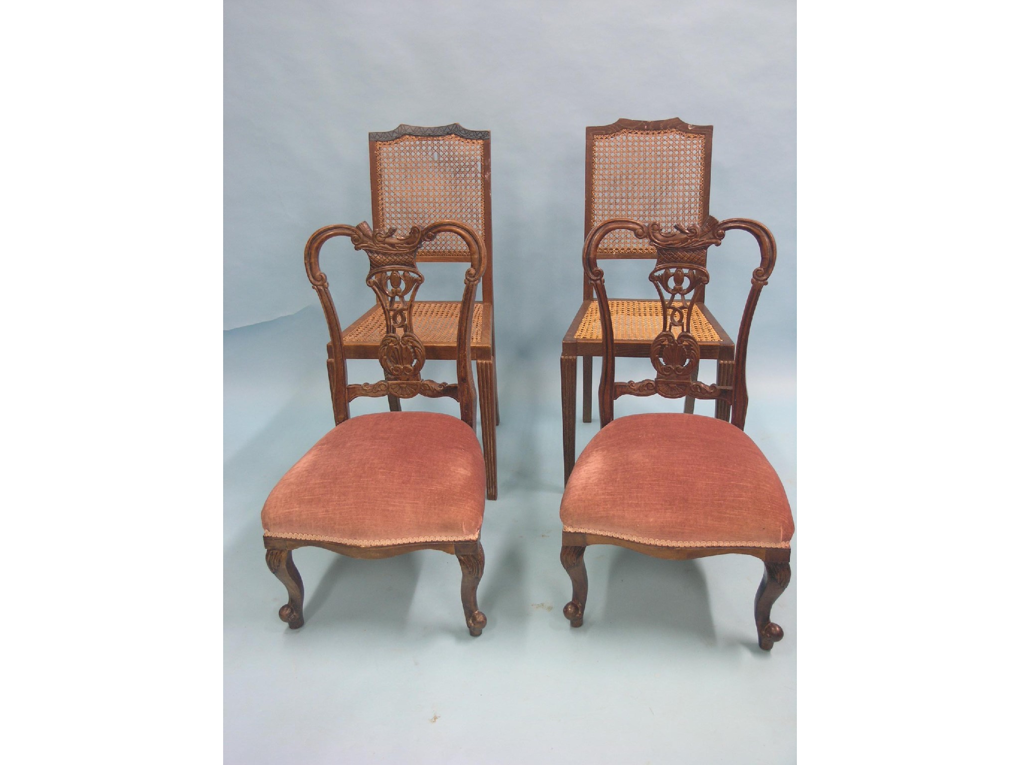 Appraisal: A pair of Victorian carved mahogany nursing chairs with upholstered