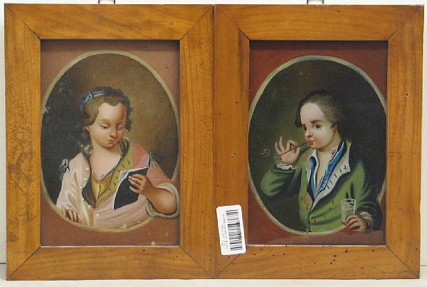 Appraisal: A pair of reverse painted glass portraits of children th