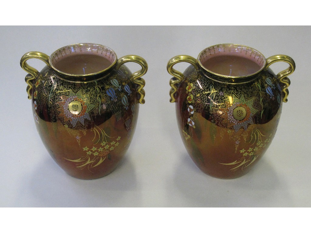 Appraisal: Pair of Carlton Ware 'Babylon' vases on rouge ground pattern