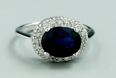 Appraisal: Lady s diamond sapphire ring oval blue sapphire estimated weight