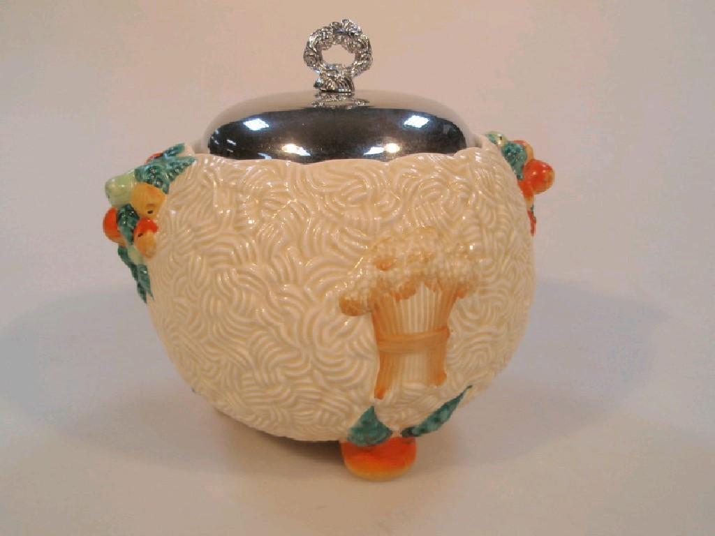 Appraisal: A Clarice Cliff Celtic Harvest biscuit barrel with an electroplate