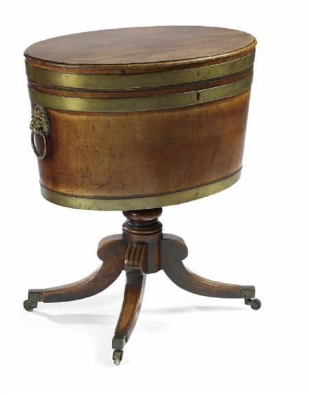 Appraisal: A George III mahogany and brass bound oval wine cooler