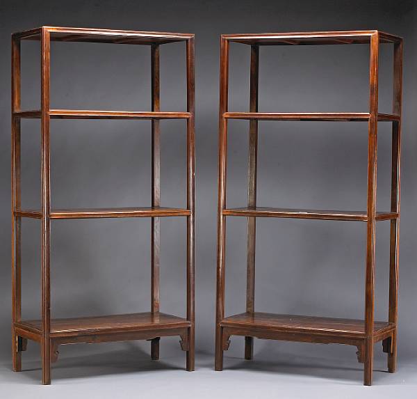 Appraisal: A pair of nanmu book cabinets sanceng jiage th Century