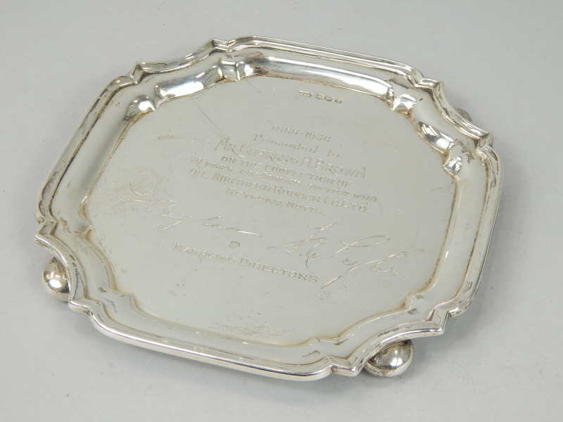 Appraisal: A George V silver canted rectangular waiter inscribed - presented