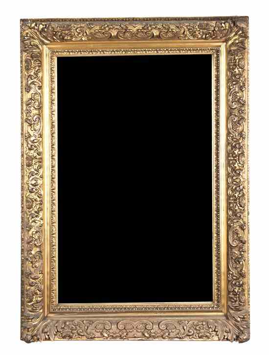 Appraisal: A Victorian Giltwood Mirror the rectangular plate set within a