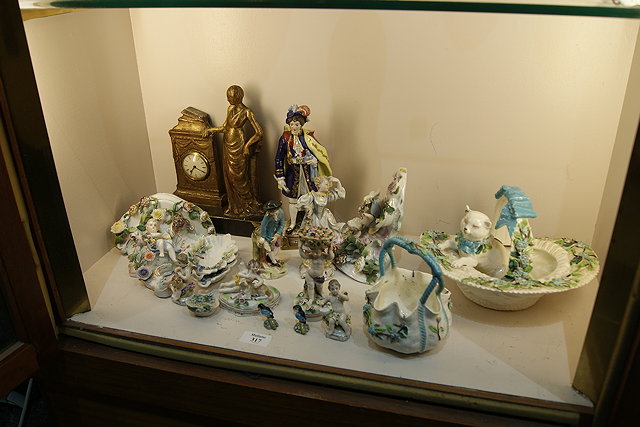 Appraisal: A COLLECTION OF PORCELAIN FIGURES a Moore Co style porcelain