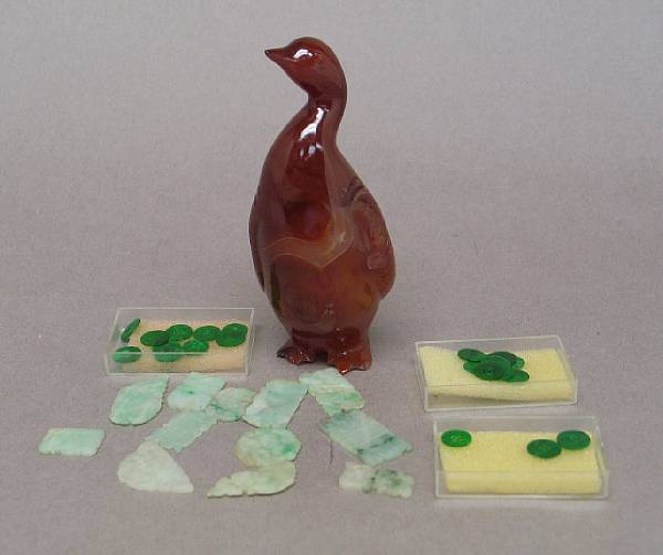 Appraisal: A group of jadeite buttons Comprising twenty-three paper-thin apple green