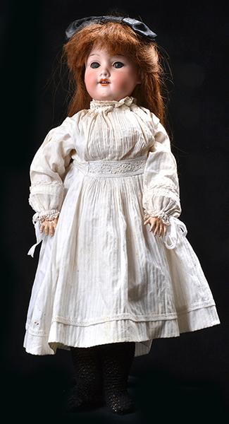 Appraisal: AN ARMAND MARSEILLE AM BISQUE HEAD BALL JOINTED GIRL DOLL