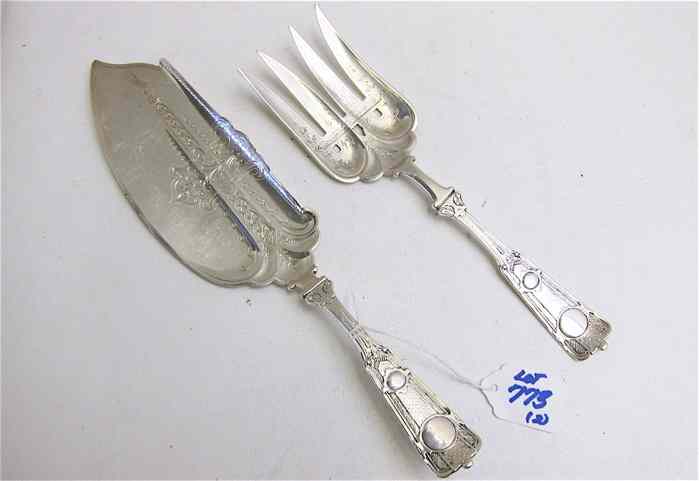 Appraisal: AN AMERICAN VICTORIAN STERLING SILVER FISH SERVING FORK AND FISH