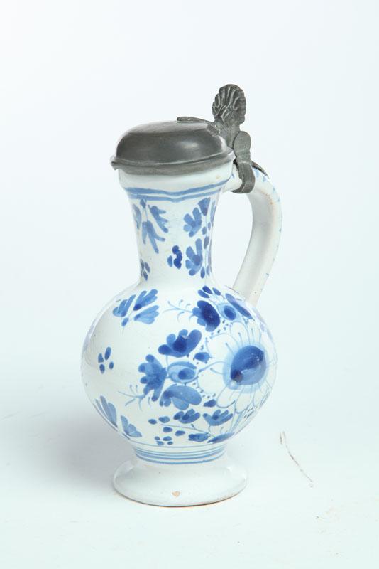 Appraisal: SMALL DELFT EWER Possibly England th century tin glazed earthenware