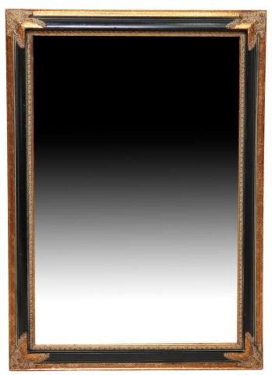 Appraisal: Decorative wall mirror th st c having parcel ebonized frame