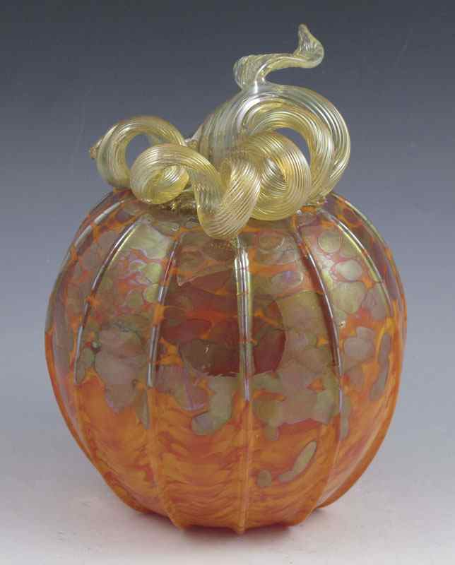 Appraisal: LUNDBERG STUDIOS ART GLASS PUMPKIN Mottled orb irridescent ''leaves and