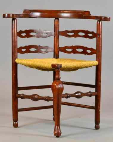 Appraisal: An American Rush Seat Corner ChairWith shaped rail and pierced