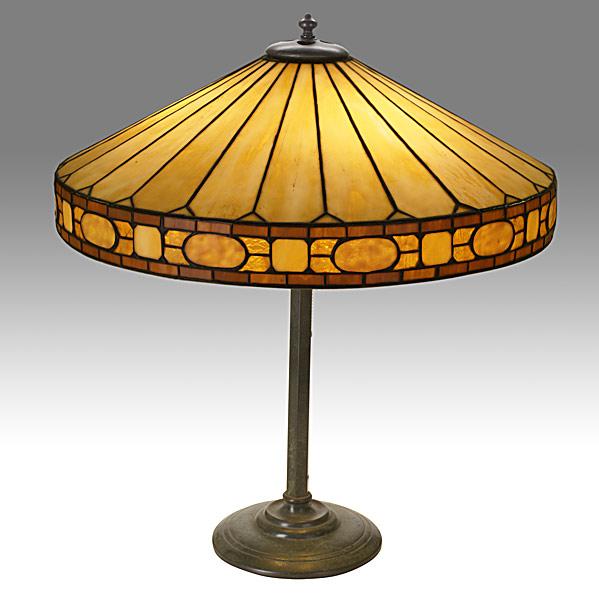 Appraisal: WILLIAMSONTable lamp with leaded glass shade on bronze baseUnmarked x