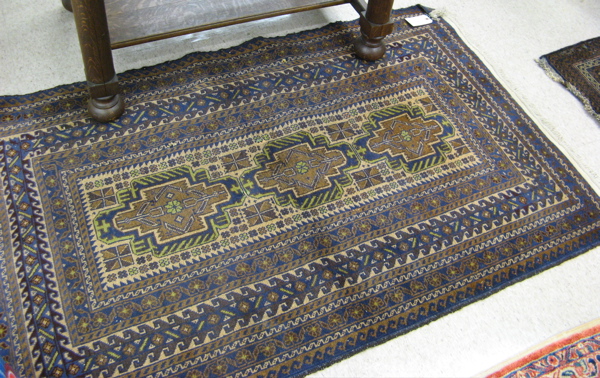 Appraisal: TWO HAND KNOTTED ORIENTAL AREA RUGS Pakistani Belouch a '