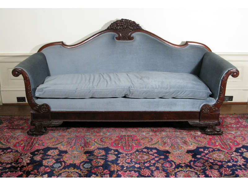 Appraisal: Empire Sofa American th c mahogany frame with carved fruit