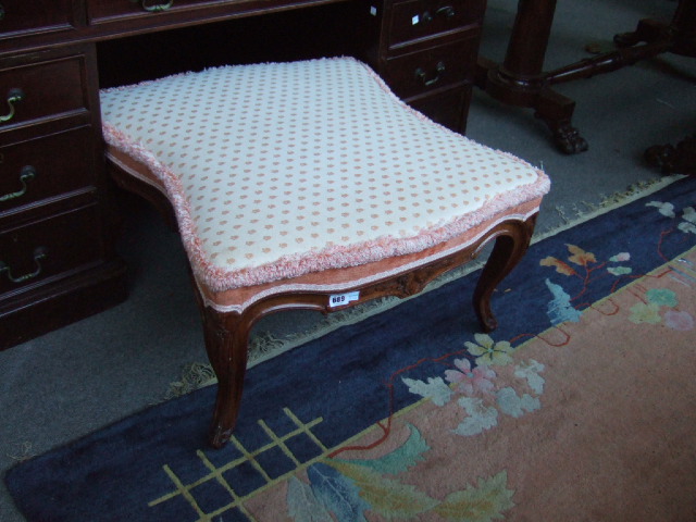 Appraisal: A Louis XV style walnut framed square footstool with shaped