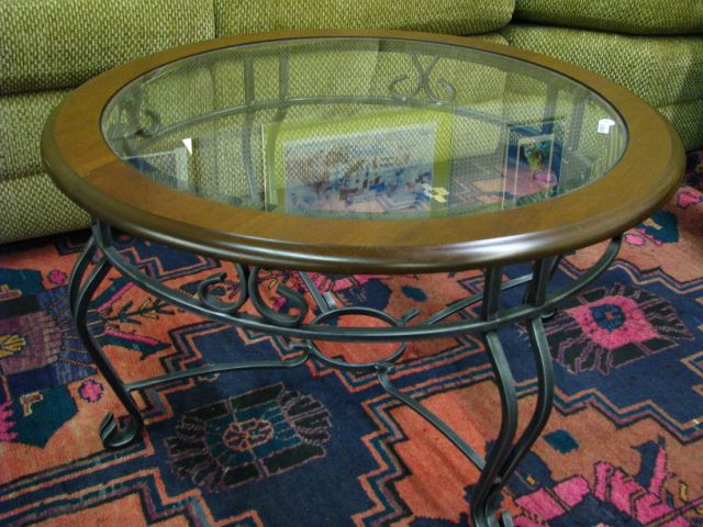 Appraisal: Contemporary glass top cocktail table round high natural wood over