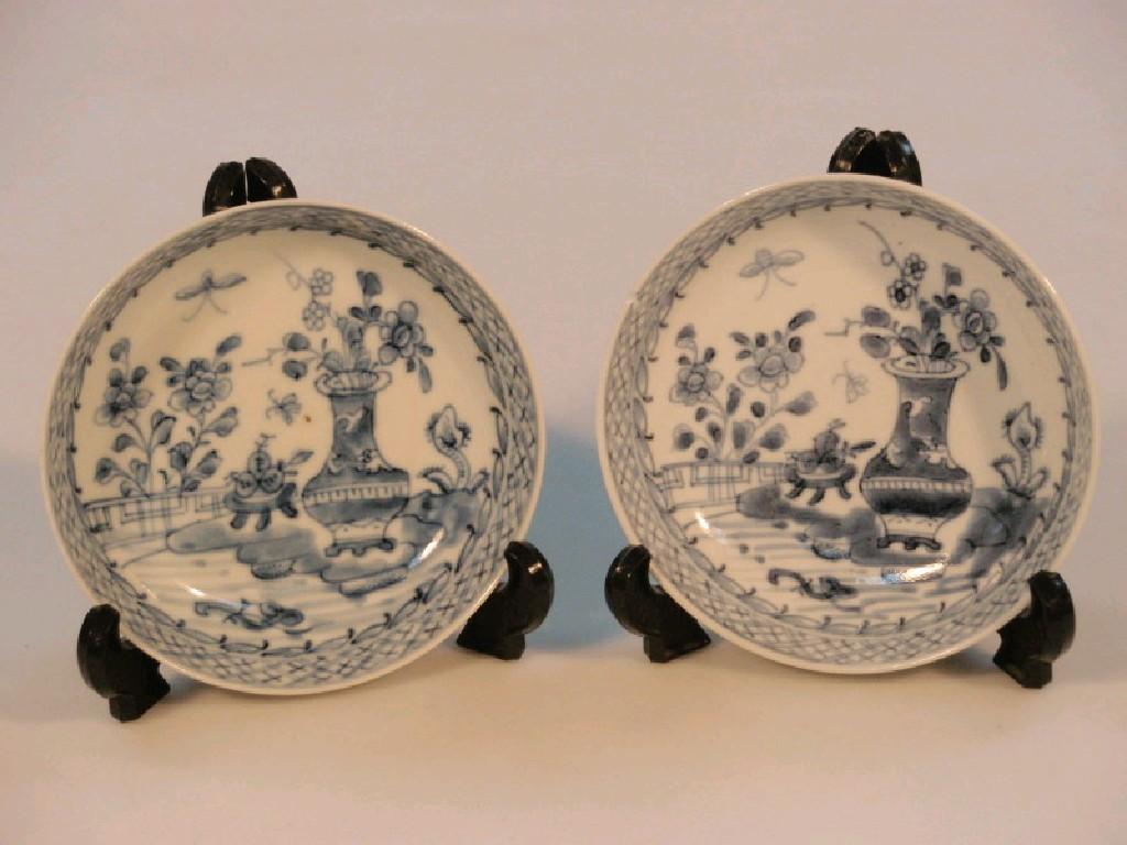 Appraisal: A pair of Chinese export blue and white saucers each