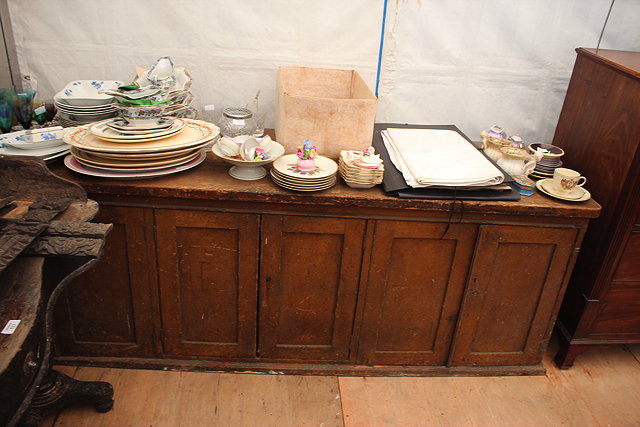 Appraisal: A VICTORIAN PINE KITCHEN CUPBOARD or dresser base with three