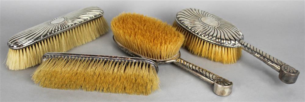 Appraisal: FOUR-PIECE SILVER BACKED DRESSER SET cast with an attractive swirling