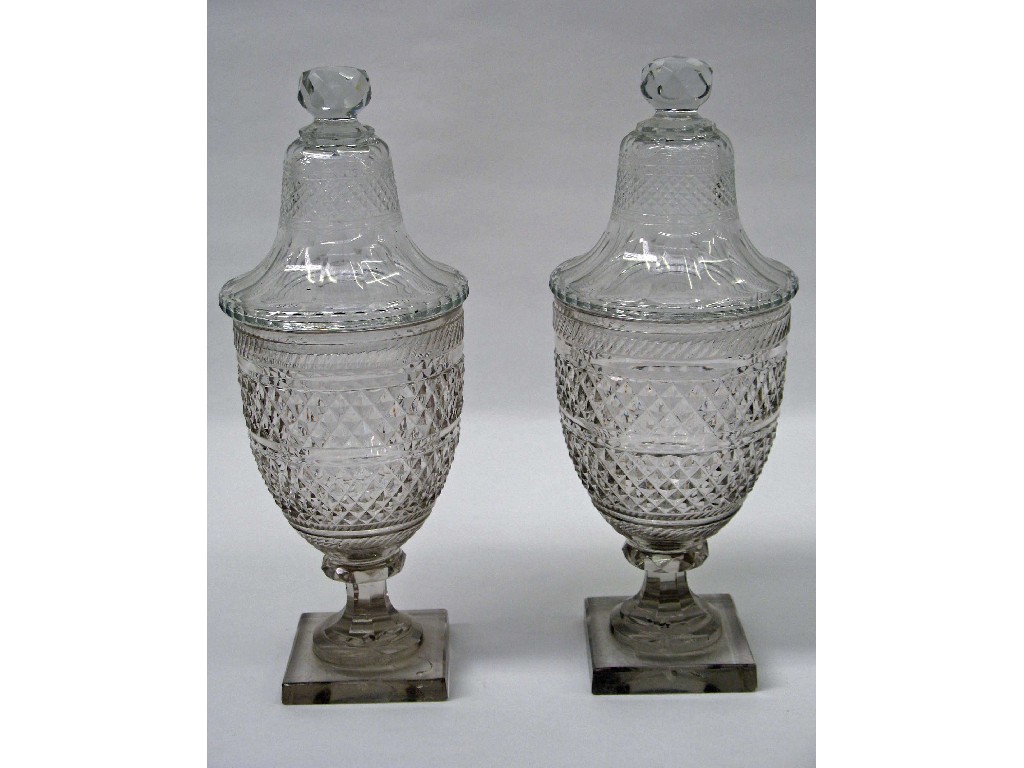 Appraisal: A pair of cut glass early Victorian urns with lids