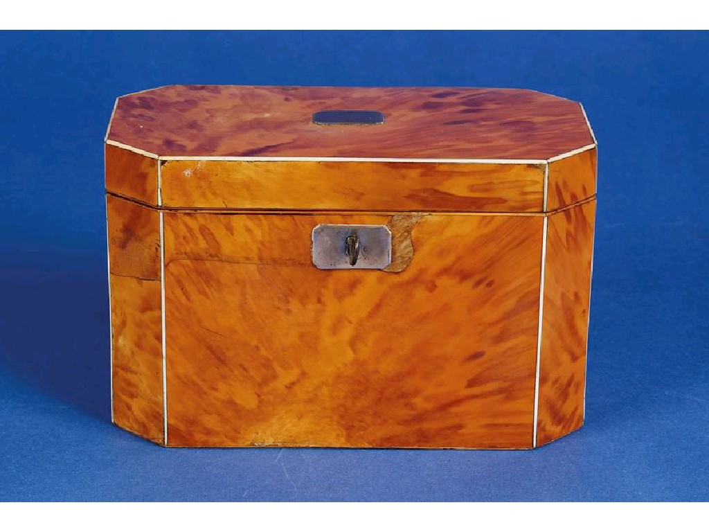 Appraisal: A GEORGE III TORTOISESHELL VENEERED TEA CADDY of elongated octagonal