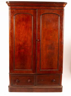 Appraisal: A Victorian mahogany wardrobe labelled for Edwards Roberts enclosed by