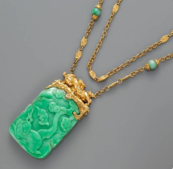 Appraisal: A carved jadeite jade necklace with extender mounted in fourteen