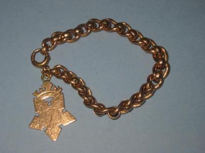 Appraisal: A CT ROSE GOLD BRACELET of curb link with faceted