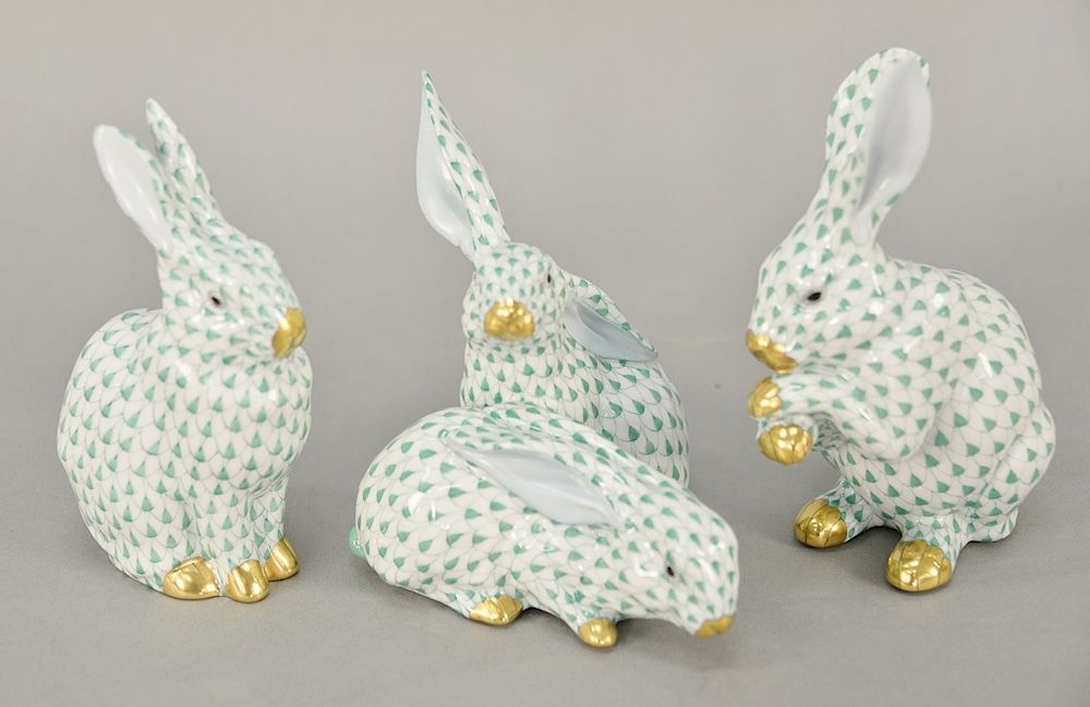 Appraisal: Group of three large Herend rabbit figurines in green fishnet