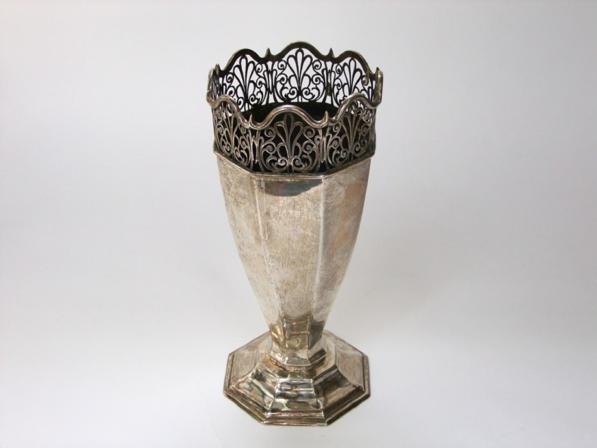 Appraisal: A large silver vase of tapering octagonal form raised on