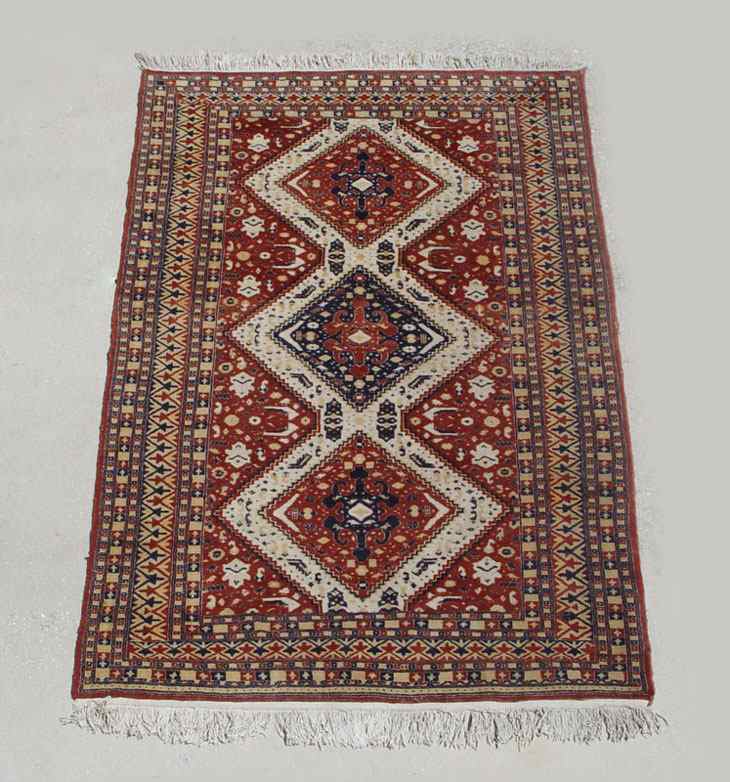 Appraisal: HAND TIED RED BLUE PERSIAN RUG Approx ' x '