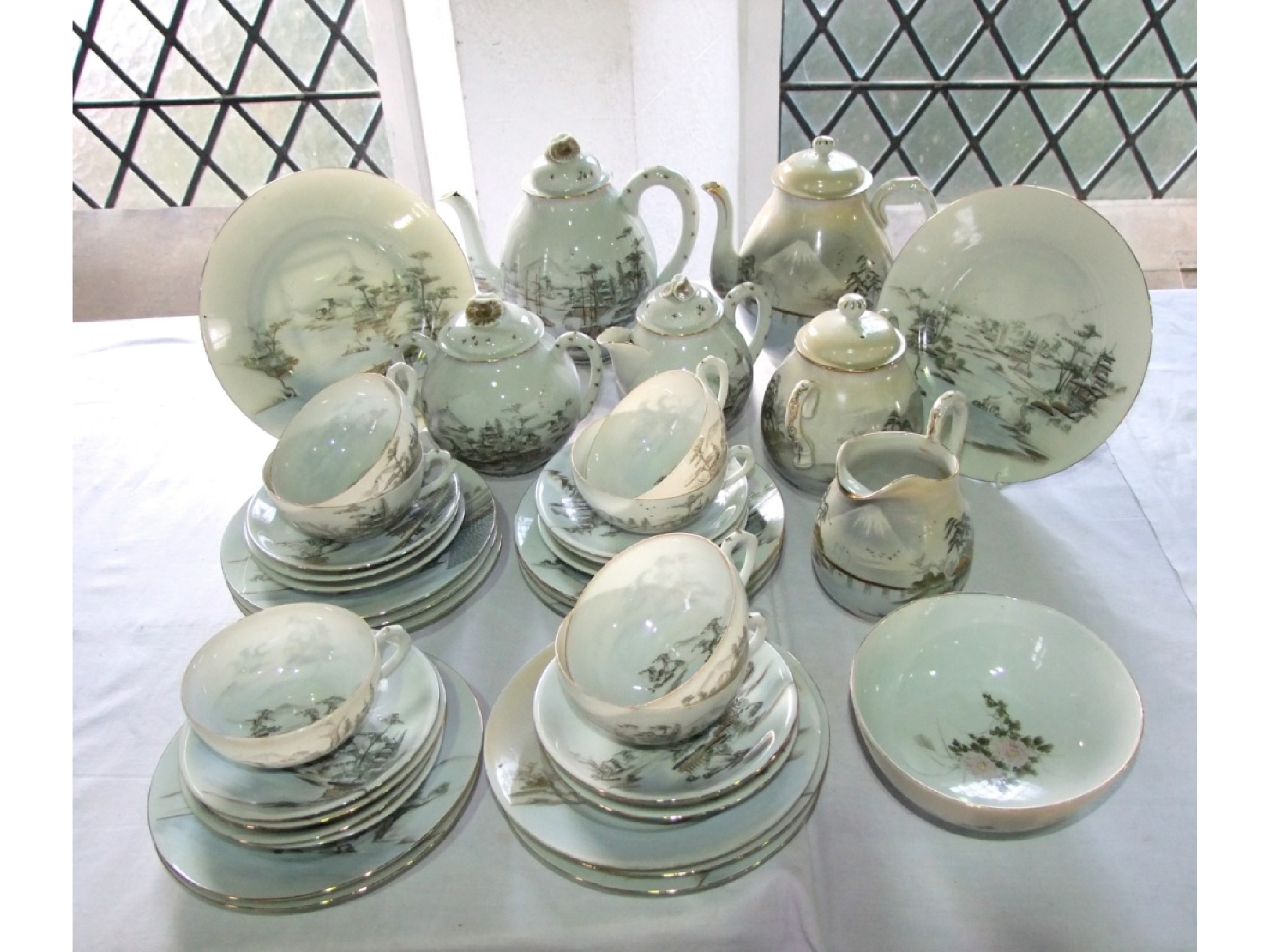 Appraisal: A collection of Japanese eggshell porcelain tea wares in two