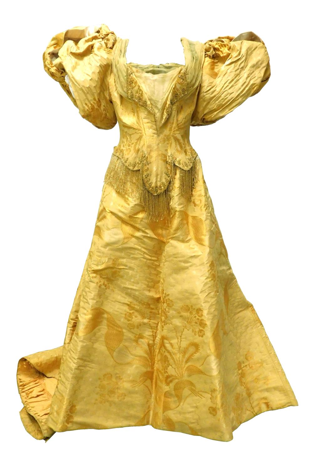 Appraisal: House of Worth yellow brocade with bead fringe evening dress